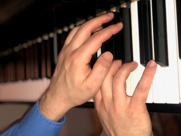 Hands on a Piano